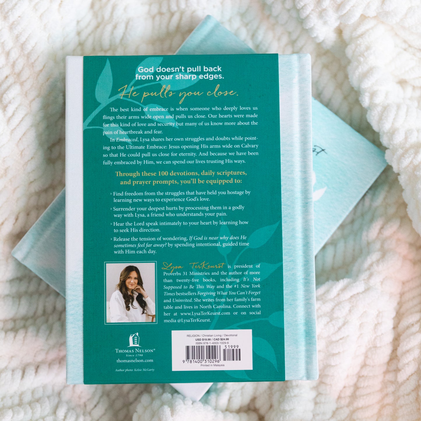 Embraced by Lysa TerKeurst | 100 Devotions to Know God Is Holding You Close